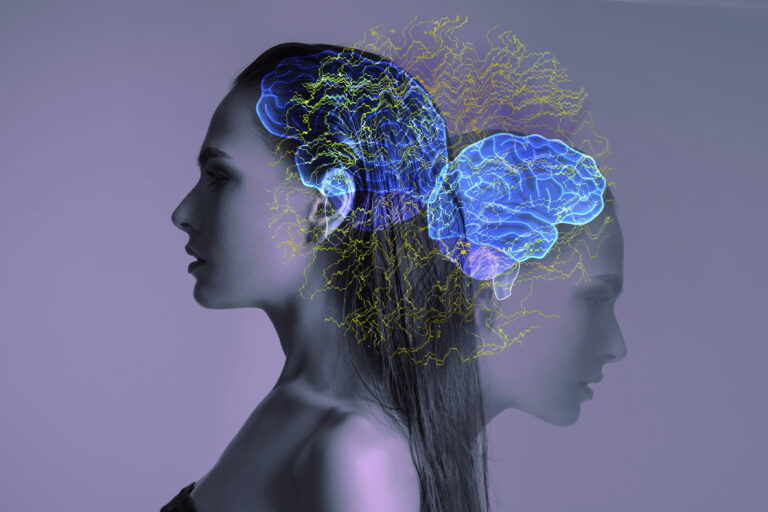 Abstract digital graphic of two silhouettes with illuminated brains representing System 1 and System 2 thinking models in consumer psychology