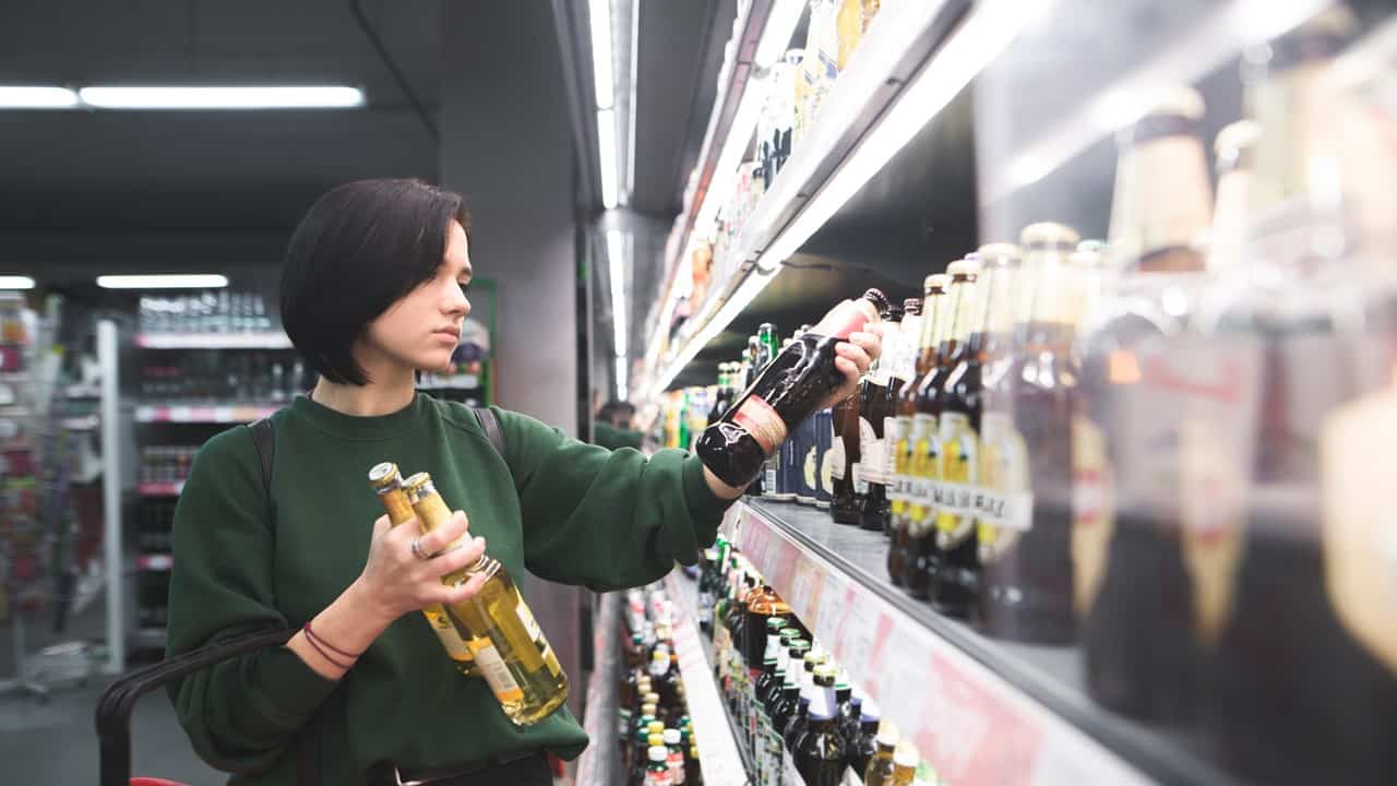 Shopper buying chilled wine