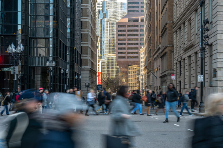 Boston, USA - MAR 2019 : Unrecognizable crowd Pedestrians and tr
