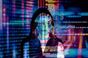 A conceptual image of a person’s face obscured by projected digital code, illustrating the risks of synthetic data and the loss of human identity in AI-driven research.
